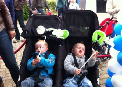 la vache qui rit -2 kinderen in kinderwagen